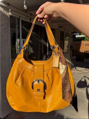 Coach Leather Shoulder Bag in a warm mustard